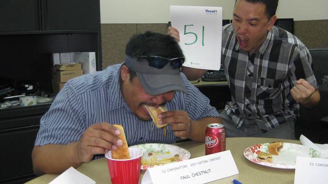 Paul with coach John at the 2014 hot dog eating contest.