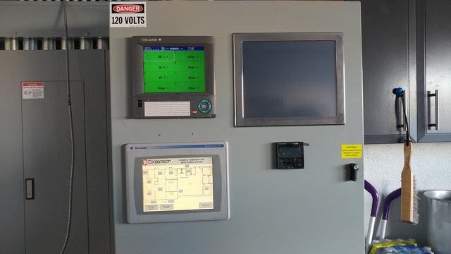 This panel monitors and records the temperature of each area in the office.